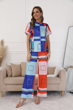 Load image into Gallery viewer, Ladies Fashion Printed Shirt Short Sleeve Lapel Temperament Commuter Versatile Slacks 2 Piece Set
