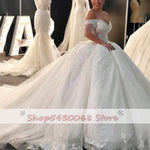 Load image into Gallery viewer, Luxury Beaded Lace Wedding Dresses New Elegant Off Shoulder Tulle Bridal Wedding Gowns Sweetheart Princess Bridal Dress
